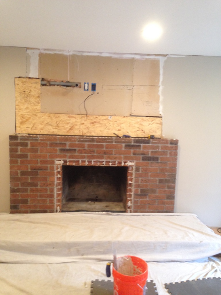 fireplace rip out and reinstall with brick surround