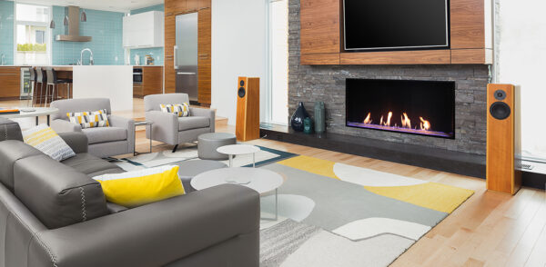 electric fireplace with custom surround and single sided barrier screen