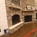 The image shows several different fireplace examples in our showroom